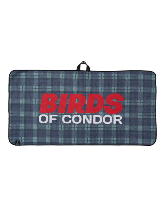 A green and blue plaid golf towel featuring large red and white printed text reading BIRDS OF CONDOR.