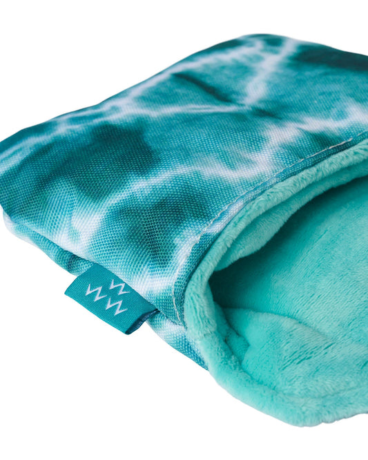 Detail of a turquoise tie-dye mallet putter headcover featuring a soft aqua lining and a small side tag.