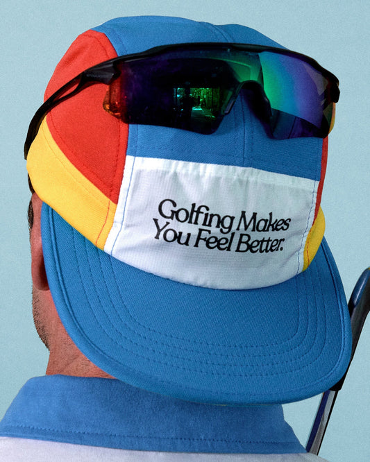 Back of a multi-colour athletic cap with a white front panel reading Golfing Makes You Feel Better.