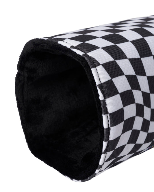 Detail of a black and white checkered headcover featuring a soft black interior lining and colorful graphic design.