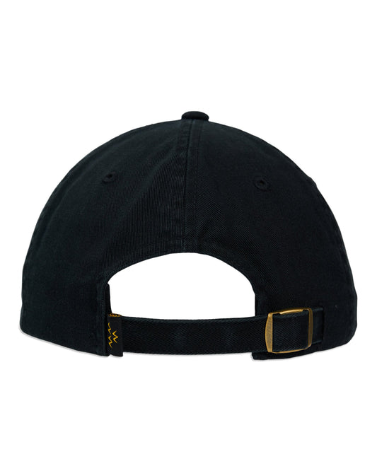 Back of a black cotton cap with an adjustable strap and a bronze metal buckle, plus an embroidered side logo.