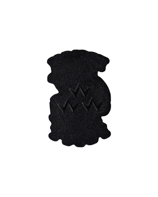 White golf ball marker featuring a pebble-textured surface and an embossed triple eagle logo in the center.