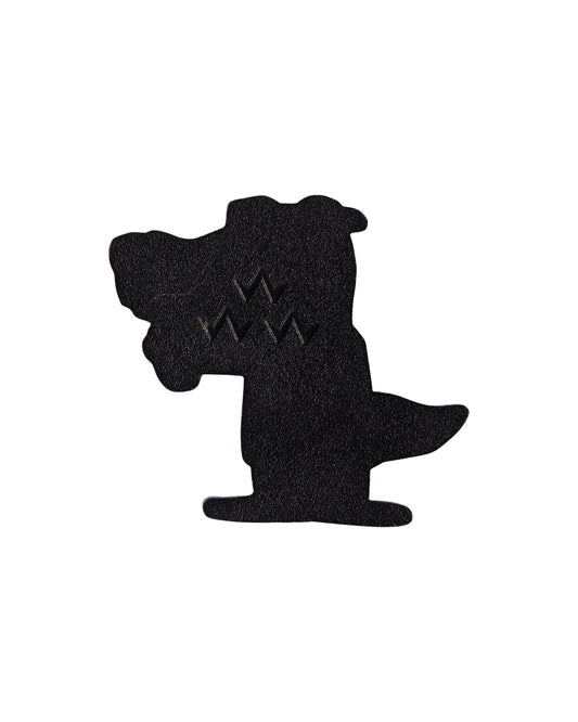 A black golf ball marker shaped like a cartoon alligator with a textured pebble finish and a triple eagle logo.