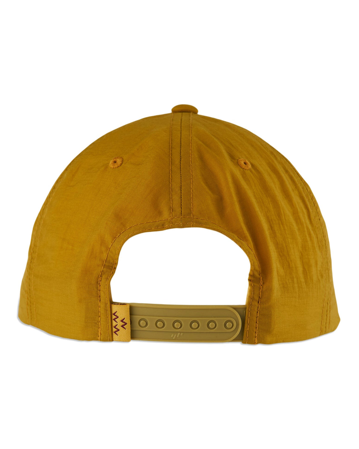 Back of a gold nylon cap with a plastic snapback closure and a small woven tag on the strap.