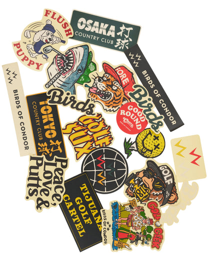 Assorted stickers featuring golf graphics, text designs, and illustrated characters in various colours.