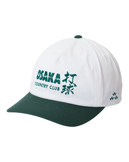 White and green snapback cap featuring an Osaka Country Club embroidery on the front and a green top button.