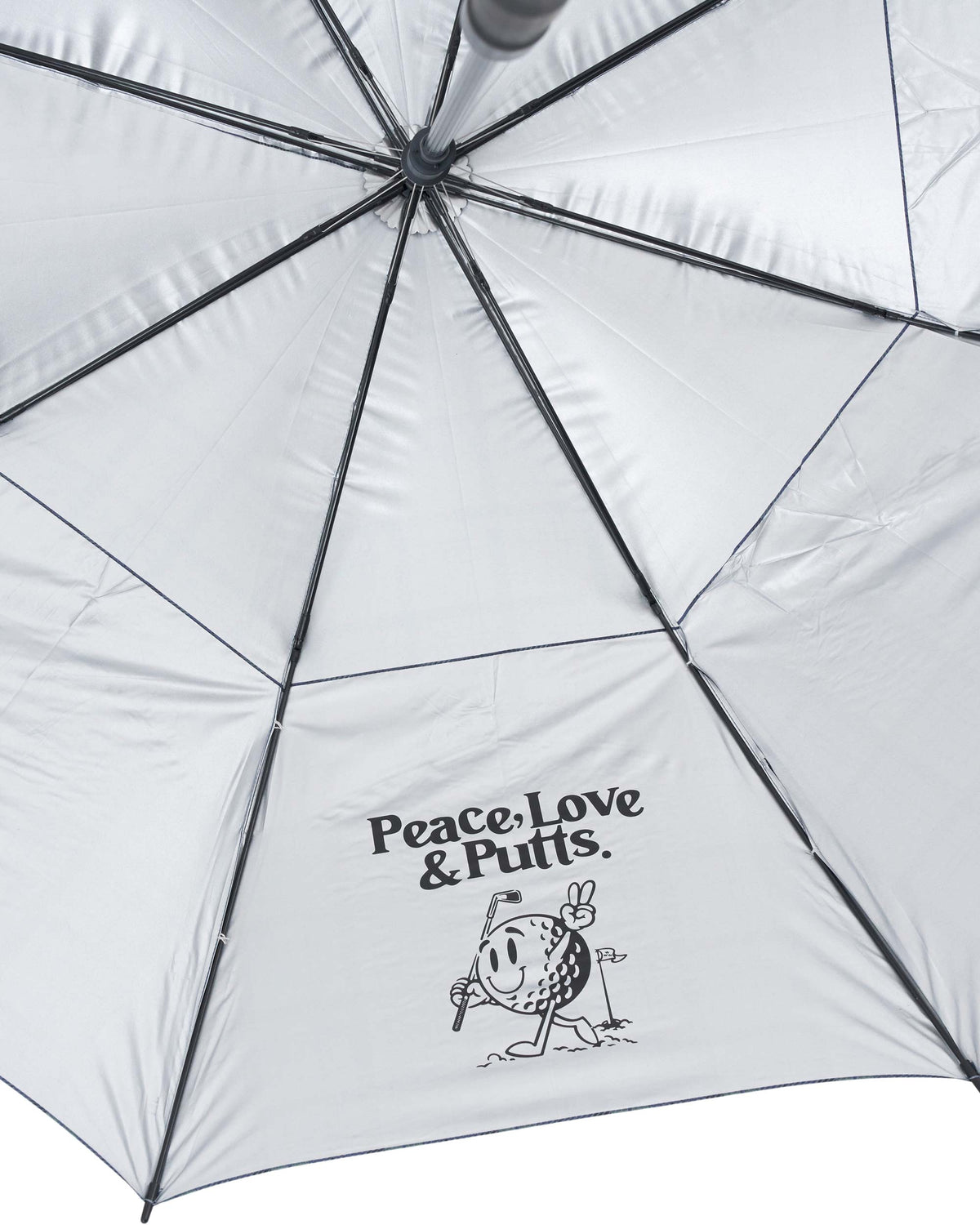 Detail of a fairwaycheck polyester umbrella featuring a metal frame and Peace Love & Putts inner panel print.