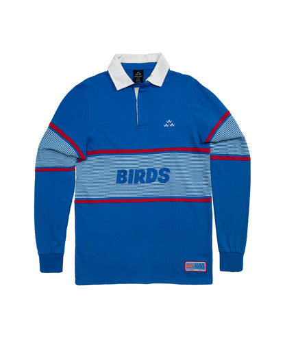 Blue cotton sweater with white collar, striped midsection, embroidered chest logo, and placket.