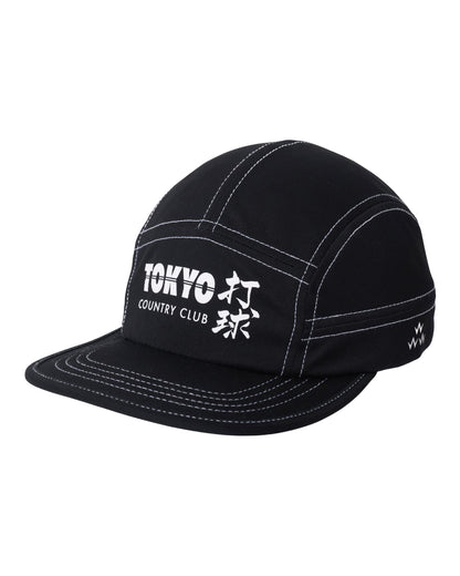 Front of a black sports cap with white contrast stitching and a printed front Tokyo Country Club graphic.