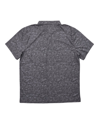 Back of an acid black polo shirt featuring a mottled print and a classic folded collar.