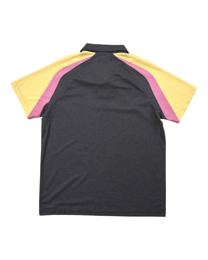 Back of a black polo shirt featuring yellow and pink race stripes across the shoulders and sleeves.