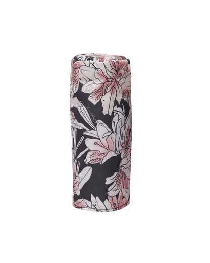 An azalea print fairway wood headcover in black with a pink and white floral graphic design.