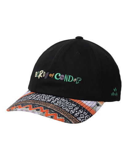 Black cap with an orange and black patterned brim, front logo embroidery, and green side branding.