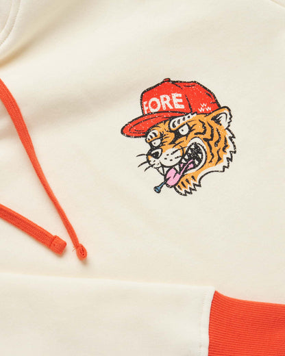 Detail of an antique white hoodie with an orange tiger graphic, matching drawcords, and an orange cuff.