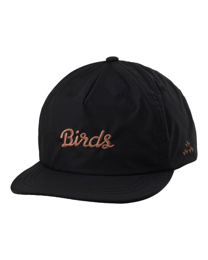 Front of a black five-panel nylon snapback featuring embroidered brown script reading Birds across the crown.