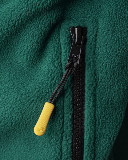 Detail of an Amazon green fleece sweater featuring a black zipper with a yellow pull.