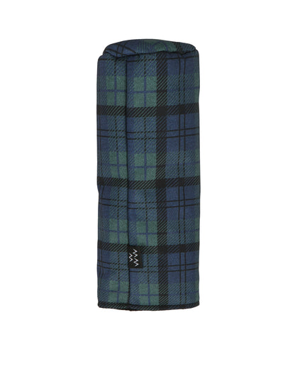 Blue and green plaid headcover with a cylindrical design and a small black woven tag on the lower side.