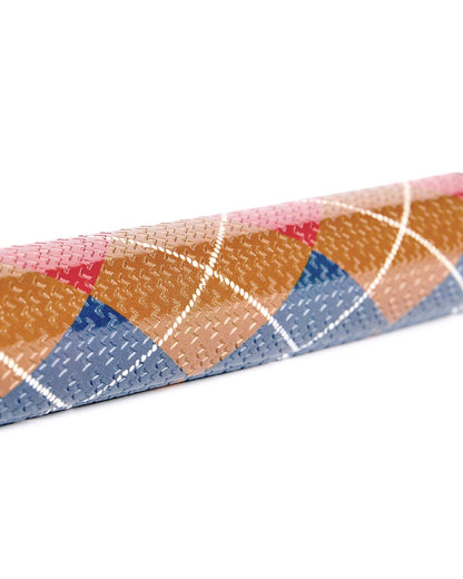 Detail of an argyle putter grip in brown, pink, and blue with white diamond overlay lines.