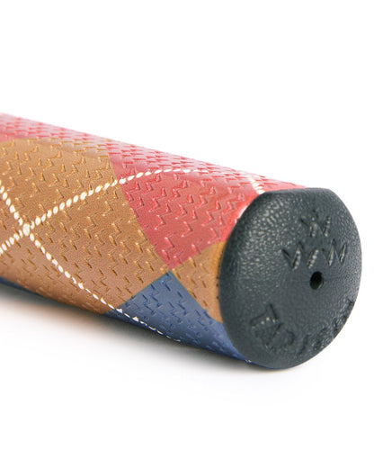 Detail of an argyle putter grip in red, tan, and blue with a textured chevron pattern and black end cap.