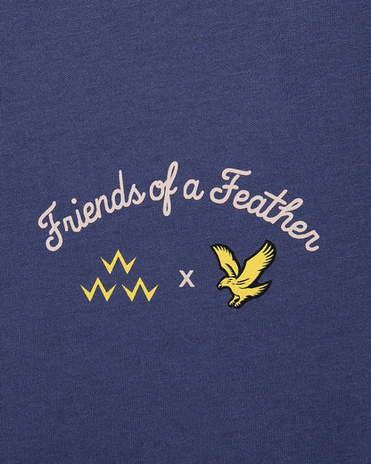 Detail of crown blue t-shirt with printed Friends of a Feather arched text, yellow bird and crown logos.