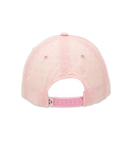 Back of faded pink nylon snapback hat with adjustable plastic strap and small woven logo tag.