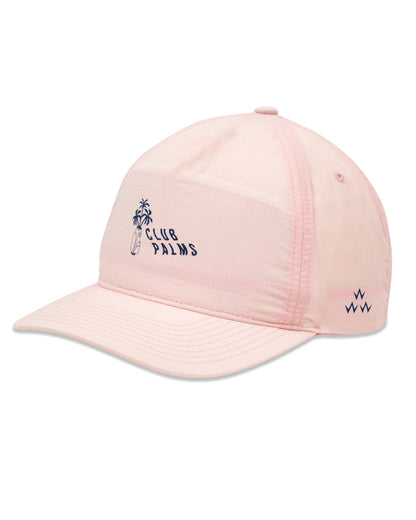 Faded pink 5-panel nylon cap featuring a navy Club Palms graphic and curved brim.