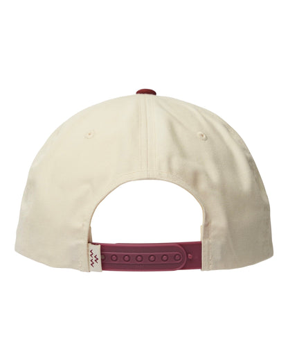 Back of an off-white cotton snapback with a red wine strap, top button, and a small tag.