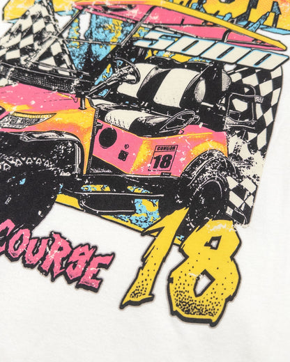 Detail of a white t-shirt featuring a retro print of a pink and yellow golf cart with checkered flags.