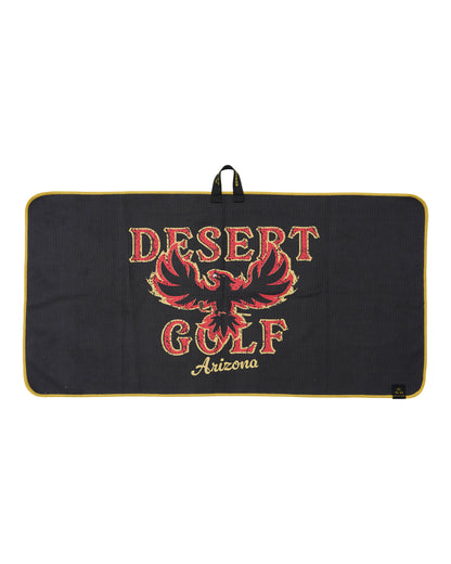 A black rectangular golf towel with a gold trim and handle, featuring a red and gold phoenix graphic and the text 'DESERT GOLF Arizona'.