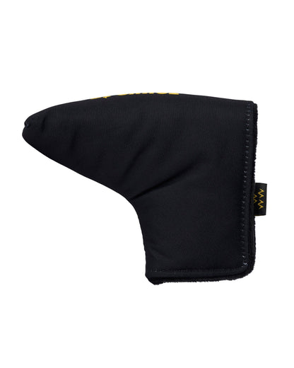 A black blade putter headcover with a small yellow graphic tag on the side edge.