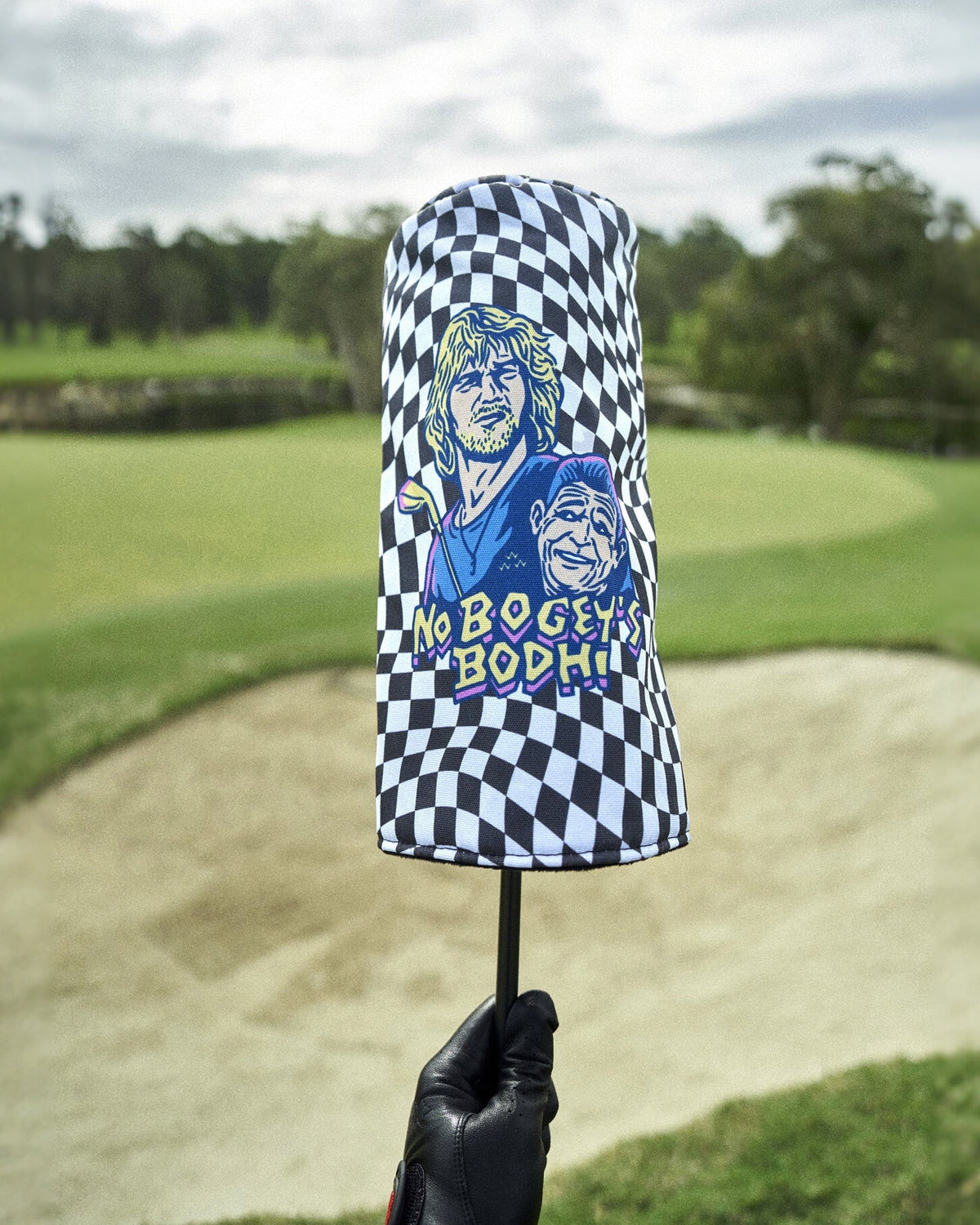 Black and white checkered headcover featuring a graphic of two men and the text No Bogey's Bodhi.