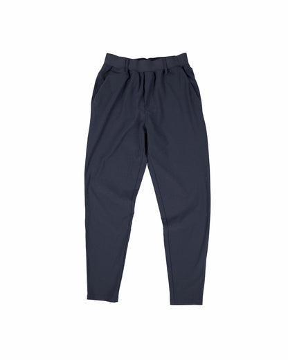Front of navy four-way stretch pants with elastic waist, belt loops, side pockets, and tapered ankles.