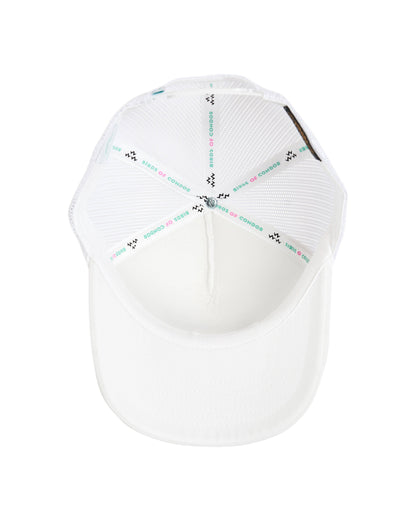 Inside view of a white trucker hat with branded interior taped seams and mesh panels.